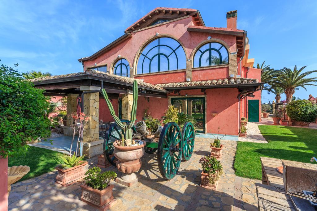Casa Vacanze Villa Flumini Флумини-ди-Кварту Экстерьер фото