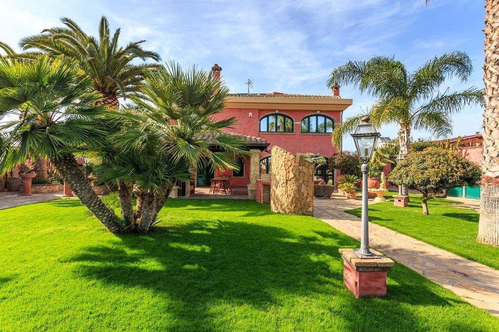 Casa Vacanze Villa Flumini Флумини-ди-Кварту Экстерьер фото